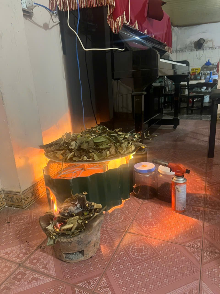 Herbal fumigation and clay stove used in a 3-layer ecological mosquito control experiment in Di Linh Vietnam